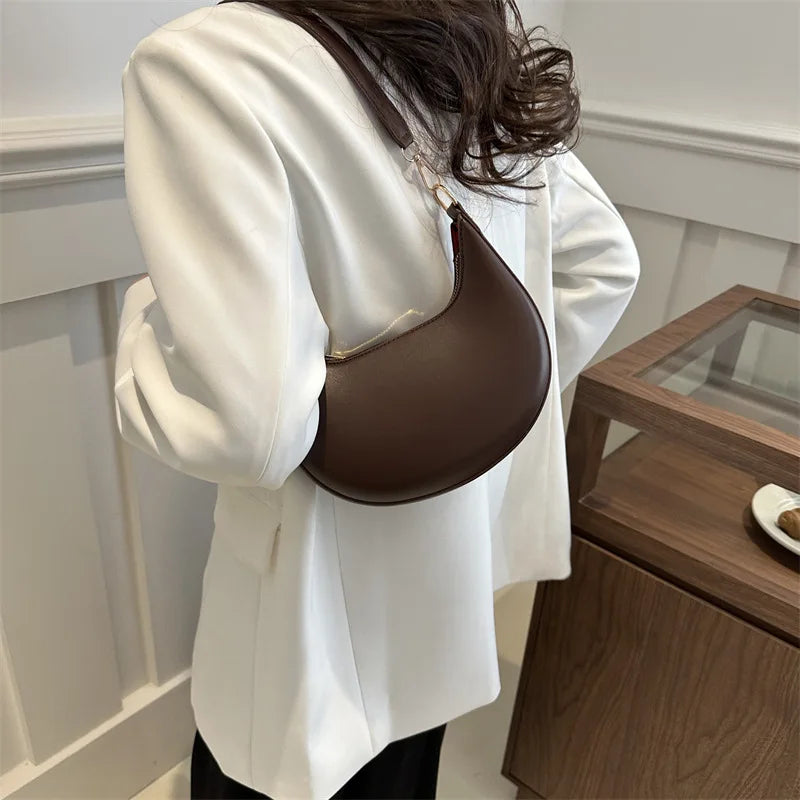 Moon-shaped Baseball Bag