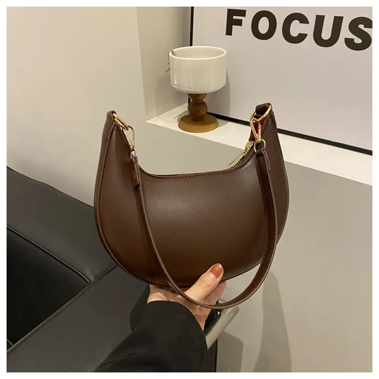 Moon-shaped Baseball Bag